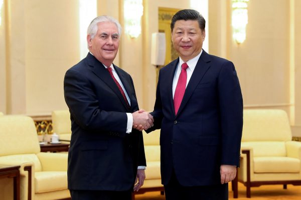 Chinese President Xi Jinping (R) shakes hands with US Secretary of State Rex Tillerson before their meeting at at the Great Hall of the People on 19 March 2017 in Beijing, China. (Photo: Reuters/Lintao Zhang).