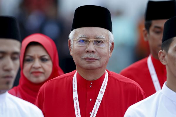 Malaysia's Prime Minister Najib Razak inspects the United Malays National Organisation (UMNO) youth during the annual assembly at the Putra World Trade Centre in Kuala Lumpur, Malaysia, 10, December, 2015 (Photo: Reuters/Olivia Harris)