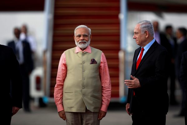 Indian Prime Minister Narendra Modi stands next to Israeli Prime Minister Benjamin Netanyahu during a farewell ceremony upon Modi's departure from Israel at Ben Gurion International Airport, near Tel Aviv, Israel, 6 July 2017. (Photo: Reuters/Amir Cohen).