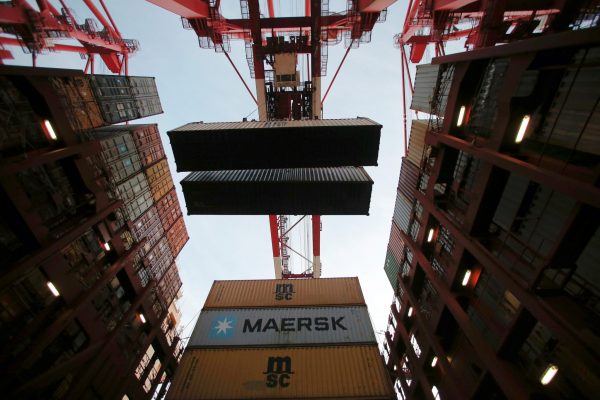 Containers are seen unloaded from the Maersk's Triple-E giant container ship Maersk Majestic, one of the world's largest container ships, at the Yangshan Deep Water Port, part of the Shanghai Free Trade Zone, in Shanghai, China, 24 September 2016. (Photo: Reuters/Aly Song).