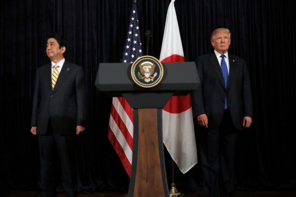 US President Donald Trump and Japanese Prime Minister Shinzo Abe leave after delivering remarks on North Korea at Mar-a-Lago club in Palm Beach, Florida, US, 11 February 2017. (Photo: Reuters/Carlos Barria).