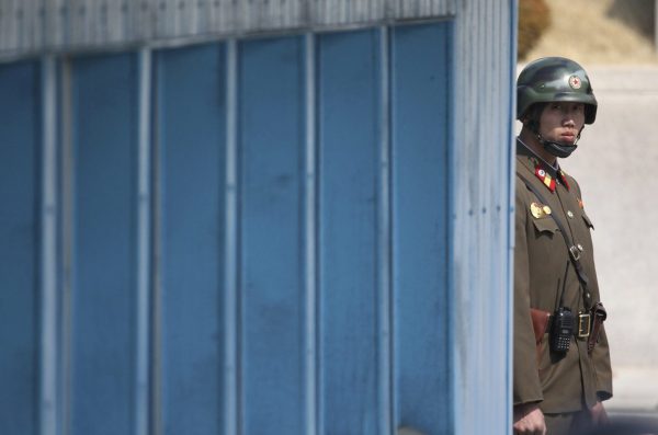 A North Korean soldier looks at the south side while US Secretary of State Rex Tillerson visits the border village of Panmunjom, which has separated the two Koreas since the Korean War, South Korea, 17 March 2017. (Photo: Reuters/Lee Jin-man).