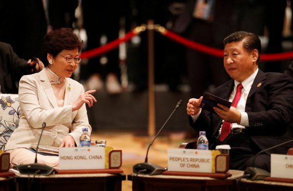 China's President Xi Jinping and Hong Kong's Chief Executive Carrie Lam talk during the APEC–ASEAN dialogue, on the sidelines of the APEC summit, in Danang, Vietnam, 10 November 2017 (Reuters/Silva).