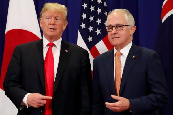 US President Donald Trump jokes with Australia's Prime Minister Malcolm Turnbull before their trilateral meeting with Japan's Prime Minister Shinzo Abe alongside the ASEAN Summit in Manila, Philippines, 13 November 2017 (Photo: Reuters/Jonathan Ernst).