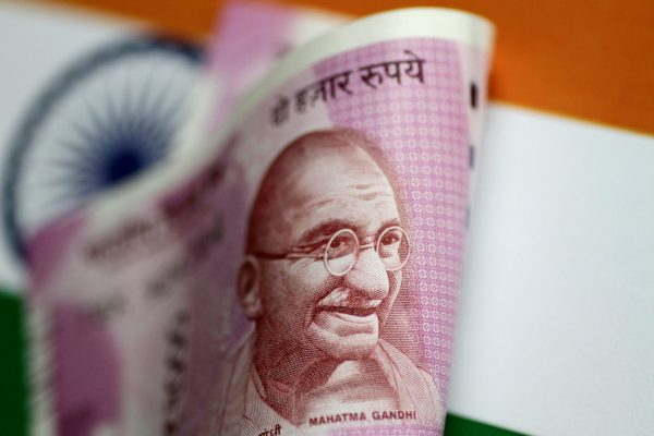 An India Rupee note is seen in this illustration photo, 1 June 2017. (Photo: Reuters/Thomas White/Illustration).
