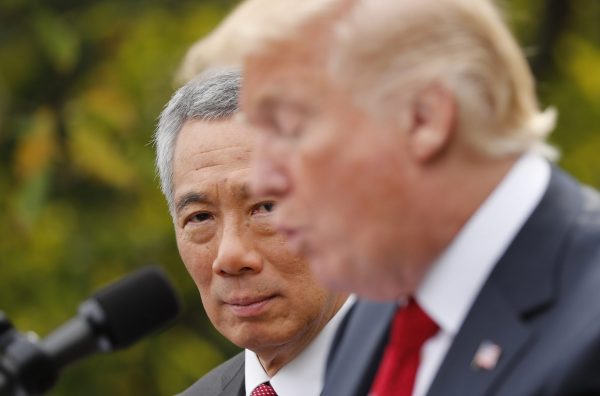 Singapore's Prime Minister Lee Hsien Loong and US President Donald Trump give joint statements in the Rose Garden of the White House in Washington DC, US, 23 October 2017 (Photo: Reuters/Jonathan Ernst).