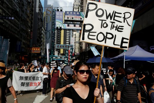 Pro-democracy activists take part in a protest on China's National Day in Hong Kong, China, 1 October 2017 (Photo: Reuters/Bobby Yip).
