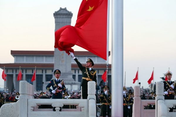 Members of Chinese People's Liberation Army (PLA) take part in the national flag-raising ceremony to mark the New Year in Tiananmen Square in Beijing, China, 1 January 2018 (Photo: Reuters/Stringer).