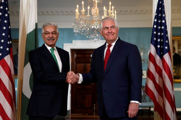 US Secretary of State Rex Tillerson shakes hands with Pakistan's Foreign Minister Khawaja Muhammad Asif before their meeting at the State Department in Washington, United States, 4 October 2017 (Photo: Reuters/Yuri Gripas).