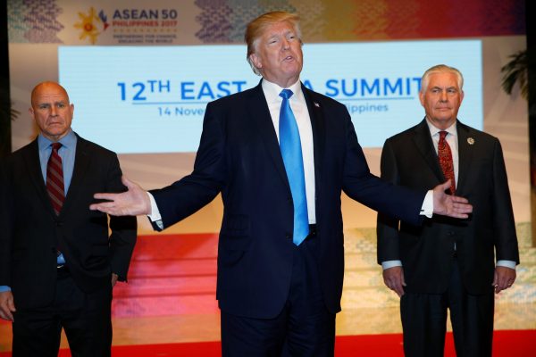 US President Donald Trump makes remarks to the media alongside US National Security Advisor HR McMaster and US Secretary of State Rex Tillerson as he attends the 12th East Asia Summit in Manila, Philippines, 14 November 2017 (Photo: Reuters/Jonathan Ernst).