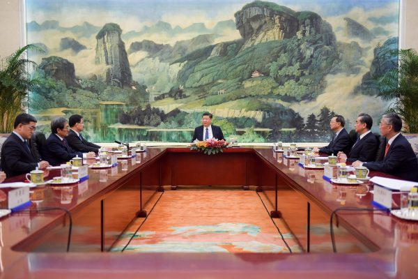 Chinese President Xi Jinping attends a meeting at the Great Hall of The People in Beijing, 12 March 2018 (Photo: Reuters/Etienne Oliveau).