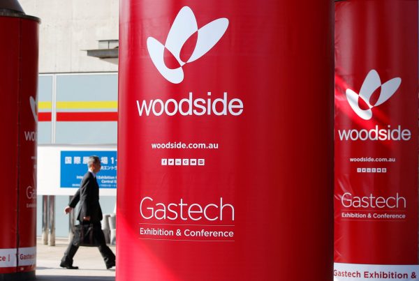 Logos of Woodside Petroleum are seen at Gastech, the world's biggest expo for the gas industry, in Chiba, Japan, 4 April 2017 (Photo: Reuters/Toru Hanai).