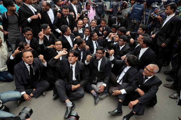 Lawyers supporting Bangladesh National Party (BNP) shout slogans as they sit on a street during protests in Dhaka, Bangladesh, 8 February 2018 (Photo: Reuters/ Mohammad Ponir Hossain).