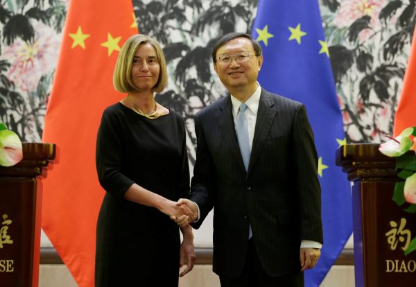 Federica Mogherini High Representative of the European Union for Foreign Affairs, shakes hands with China's State Councilor Yang Jiechi after a joint news conference at Diaoyutai State Guesthouse in Beijing, 19 China April 2017 (Photo: Reuters/Jason Lee).