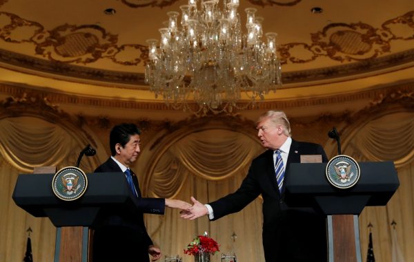 US President Donald Trump and Japan's Prime Minister Shinzo Abe shake hands as they hold a joint press conference at Trump's Mar-a-Lago estate in Palm Beach, Florida, US, 18 April 2018 (Photo: Reuters/Kevin Lamarque).
