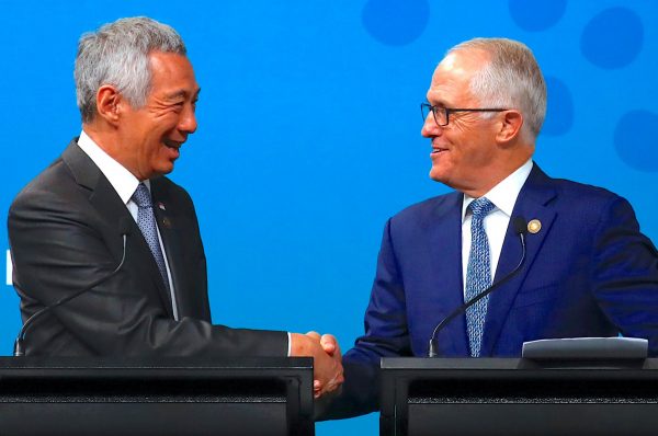 Australian Prime Minister Malcolm Turnbull shakes hands with Prime Minister of Singapore Lee Hsien Loong during their media conference during the one-off summit of 10-member Association of Southeast Asian Nations (ASEAN) in Sydney, Australia on 18 March 2018. (Photo: Reuters/ David Gray).