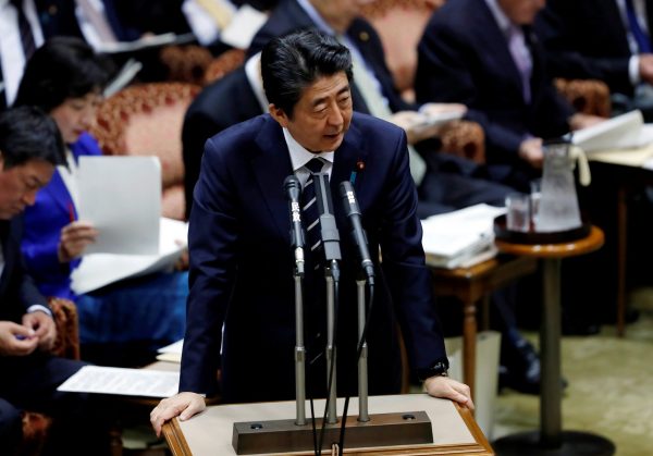 Japan's Prime Minister Shinzo Abe answers a question during an upper house parliamentary session in Tokyo, Japan, 28 March 2018 (Photo: Reuters/Issei Kato).