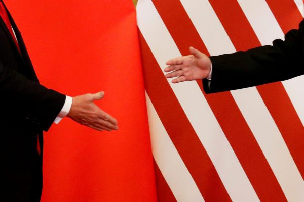 US President Donald Trump and Chinese President Xi Jinping shake hands after making joint statements at the Great Hall of the People in Beijing, China on 9 November 2017. (Photo: Reuters/Damir Sagolj).