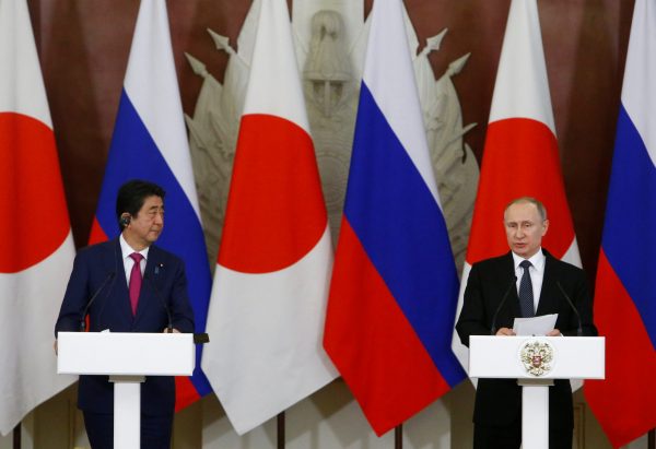Japanese Prime Minister Shinzo Abe and Russian President Vladimir Putin attend a media briefing following their meeting at the Kremlin in Moscow, Russia on 27 April 2017. (Photo: Reuters/Sergei Karpukhin).