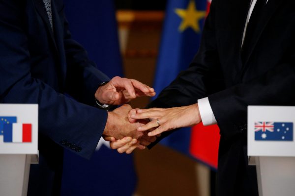 French President Emmanuel Macron shakes hands with Australian Prime Minister Malcolm Turnbull during a joint news conference at the Elysee Palace in Paris, France, 8 July 2017 (Photo: Reuters/Pascal Rossignol).
