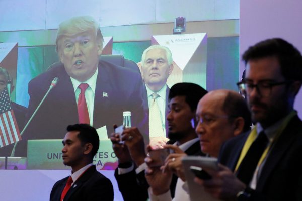 US President Donald Trump is seen speaking on a screen during the US–ASEAN Summit in Manila, Philippines, 13 November 2017 (Photo: Reuters/Jonathan Ernst).