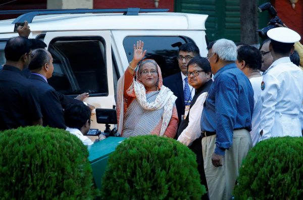 Prime Minister of Bangladesh Sheikh Hasina waves to the media after her visit at the ancestral house of the Indian poet Rabindranath Tagore in Kolkata, India, 25 May 2018 (Photo: Reuters/Rupak De Chowdhury).