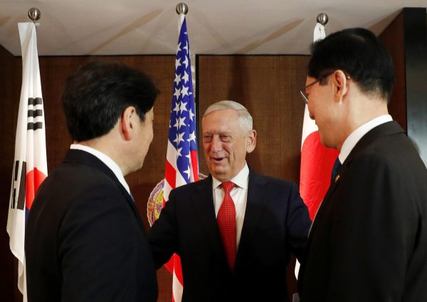 Japan's Defence Minister Itsunori Onodera, US Secretary of Defence Jim Mattis and South Korea's Defence Minister Song Young-moo attend a trilateral meeting on the sidelines of the IISS Shangri-La Dialogue in Singapore, 3 June 2018 (Photo: Reuters/Edgar Su).