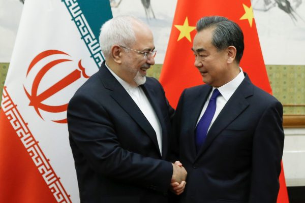 Chinese State Councillor and Foreign Minister Wang Yi meets Iranian Foreign Minister Mohammad Javad Zarif at Diaoyutai state guesthouse in Beijing on 13 May 2018. (Photo: Reuters/Thomas Peter.)