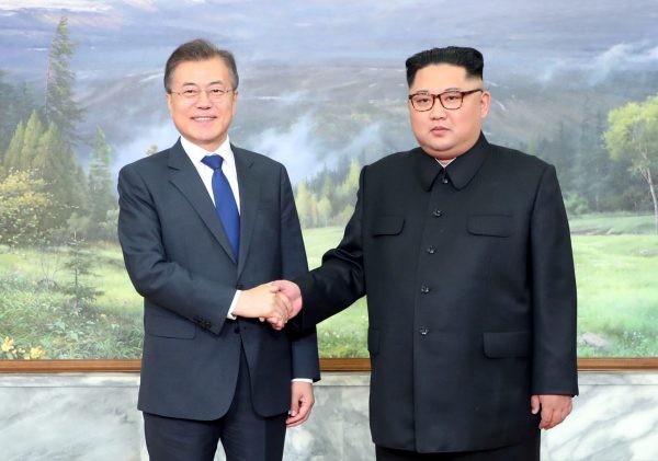 South Korean President Moon Jae-in shakes hands with North Korean leader Kim Jong Un during their summit at the truce village of Panmunjom, North Korea, 26 May 2018 (Photo: Reuters/The Presidential Blue House).
