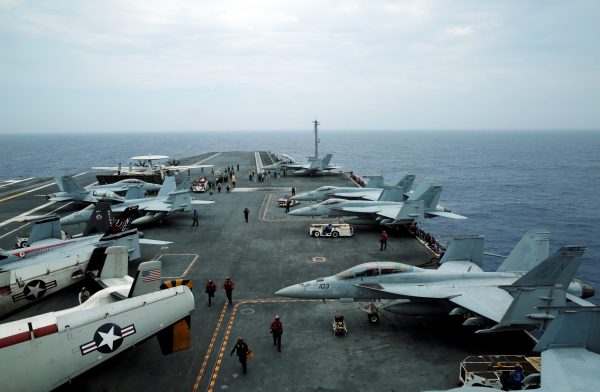 Fighter jets are seen on the US aircraft carrier John C Stennis during Malabar joint military exercises, near Okinawa, Japan, 15 June 2016. (Photo: Reuters/Nobuhiro Kubo).