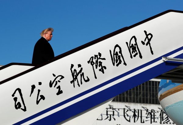 US President Donald Trump boards Air Force One to depart for Vietnam from Beijing Airport in Beijing, China, 10 November 2017 (Photo: Reuters/Jonathan Ernst).