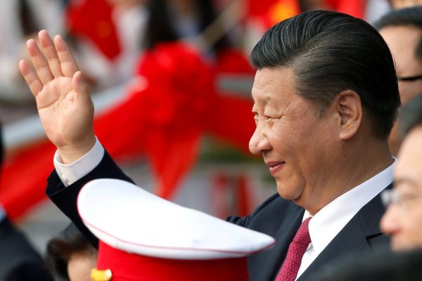 China's President Xi Jinping waves after attending the inauguration ceremony of Chinese sponsored Vietnam-China Cultural Friendship Palace in Hanoi, Vietnam on 12 November 2017. (Photo: Reuters/Nguyen Huy Kham.)