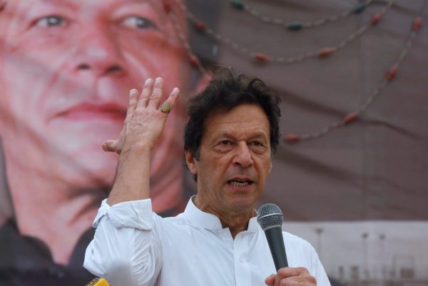 Imran Khan, chairman of the Pakistan Tehreek-e-Insaf (PTI), gestures while addressing his supporters during a campaign meeting ahead of general elections in Karachi, Pakistan, 4 July 2018 (Photo: Reuters/Akhtar Soomro).