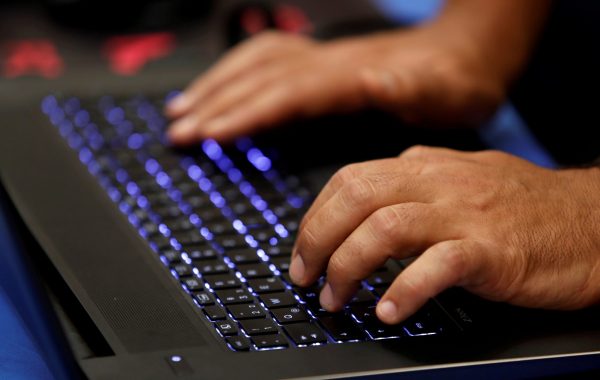 A man types into a keyboard during the Def Con hacker convention in Las Vegas, Nevada, United States, 29 July 2017 (Photo: Reuters/Steve Marcus).