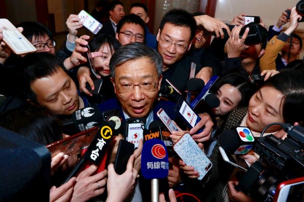 Yi Gang, current Governor and former deputy governor of the People's Bank of China, talks to the media at the Great Hall of the People during the seventh plenary session of the National People's Congress in Beijing on the day that it is announced he will replace former governor Zhou Xiaochuan, China, 19 March 2018 (Photo: Reuters/Stringer).