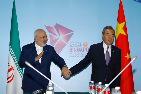 Iran's Foreign Minister Mohammad Javad Zarif and China's Foreign Minister Wang Yi attend a bilateral meeting on the sidelines of the ASEAN Foreign Ministers' Meeting in Singapore, 3 August 2018 (Photo: Reuters/Feline Lim).