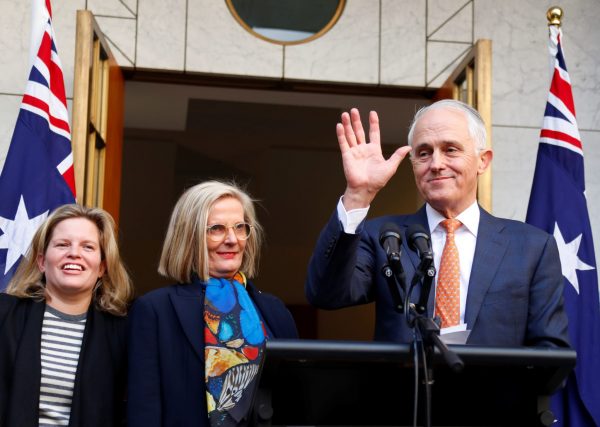 Former Australian prime minister Malcolm Turnbull waves next to wife Lucy and daughter Daisy after a news conference in Canberra, Australia, 24 August 2018 (Photo: Reuters/David Gray).