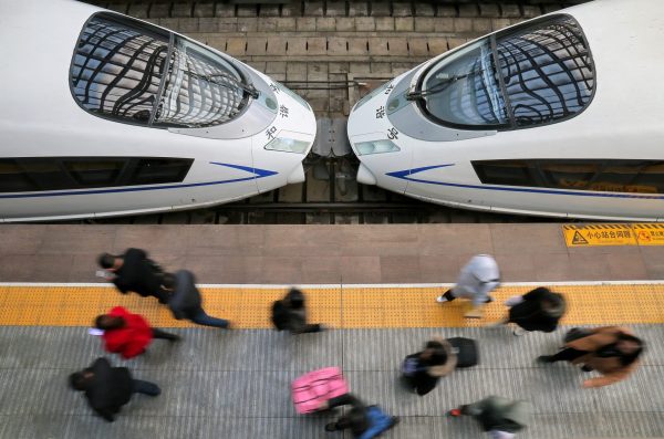 Bullet trains nose-to-nose at Yantai station, Shandong province. Infrastructure projects have contributed significantly to China’s economic performance in recent decades, but some commentators believe the marginal return on such investments has turned from positive to negative (Picture: China Daily/Reuters).