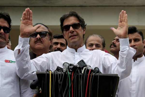 Cricket star-turned-politician Imran Khan, chairman of Pakistan Tehreek-e-Insaf (PTI), speaks after voting in the general election in Islamabad, 25 July 2018, (Photo: Reuters/Athit Perawongmetha)