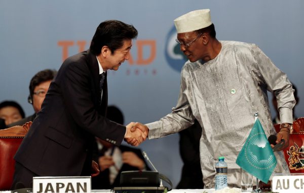 Japan's Prime Minister Shinzo Abe greets Chairperson of the African Union and Chad's President Idriss Deby as they attend Sixth Tokyo International Conference on African Development, in Kenya's capital Nairobi, 27 August 2016 (Photo: Reuters/Thomas Mukoya).