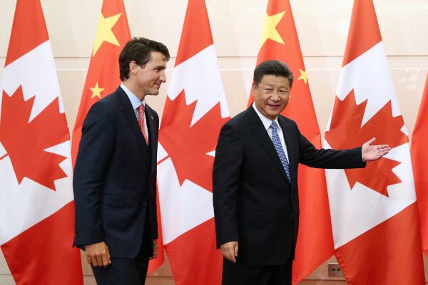 Chinese President Xi Jinping gestures to Canadian Prime Minister Justin Trudeau ahead of their meeting at the Diaoyutai State Guesthouse in Beijing, China, 31 August 2016 (Photo: Reuters/Wu Hong/Pool).