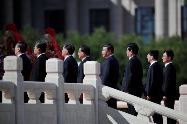 Chinese President Xi Jinping and other top leaders attend a tribute ceremony ahead of National Day marking the 69th anniversary of the founding of the People's Republic of China in Beijing, China, 30 September 2018 (Photo: Reuters/Jason Lee).