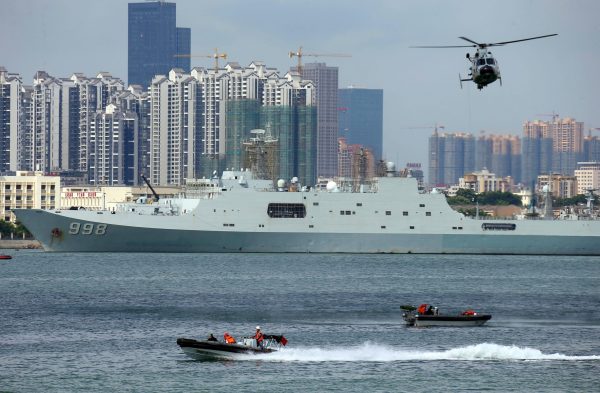 Military personnel take part in a maritime rescue exercise near Chinese amphibious transport dock Kunlun Shan during the China–ASEAN Maritime Exercise in Zhanjiang, Guangdong province, China, 23 October 2018 (Photo: Reuters/Stringer).