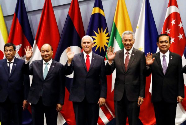 US Vice President Mike Pence poses for a group photo with Philippine President Rodrigo Duterte, Vietnam’s Prime Minister Nguyen Xuan Phuc, Singapore’s Prime Minister Lee Hsien Loong and Thailand’s Prime Minister Prayuth Chan-ocha at the ASEAN-US Summit in Singapore, 15 November 2018 (Photo: Reuters/Edgar Su).