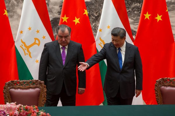 Chinese President Xi Jinping with Tajikistan's President Emomali Rahmon attend the signing ceremony during their meeting at the Great Hall of the People in Beijing, China, 31 August 2017 (Photo: Reuters/Roman Pilipey/Pool).