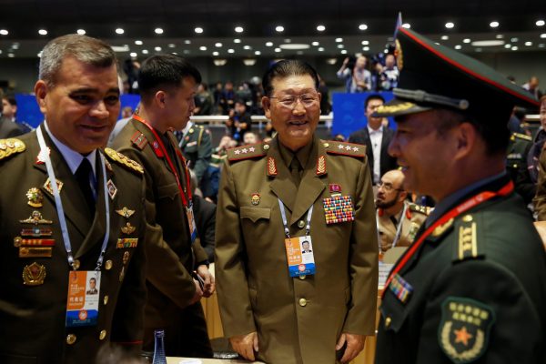 North Korea's Vice Minister of the People's Armed Forces Kim Hyong Ryong speaks with Venezuela's Defense Minister Vladimir Padrino Lopez at the Xiangshan Forum in Beijing, China, 25 October 2018 (Photo: Reuters/Thomas Peter).