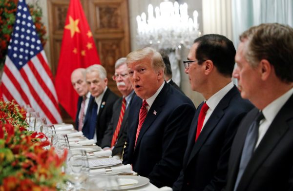 US President Donald Trump, US President Donald Trump's national security adviser John Bolton, US Treasury Secretary Steven Mnuchin attend a working dinner with Chinese President Xi Jinping after the G20 leaders summit in Buenos Aires, Argentina, 1 December 2018 (Photo: Reuters/Kevin Lamarque).