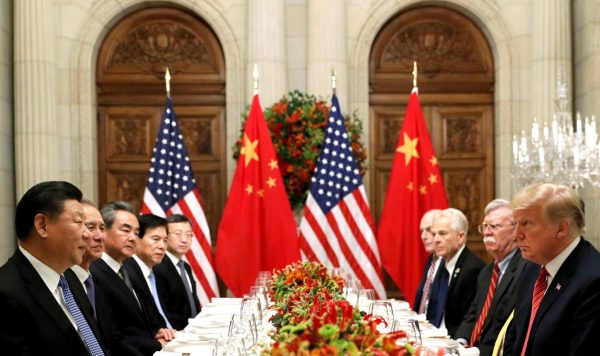 US President Donald Trump, US Secretary of State Mike Pompeo, US President Donald Trump's national security adviser John Bolton and Chinese President Xi Jinping at a working dinner after the G20 leaders summit in Buenos Aires, 1 December 2018 (Photo: Reuters/Kevin Lamarque/File Photo).