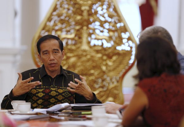 Indonesian President Joko Widodo gestures during an interview at the presidential palace in Jakarta. (Photo: Reuters/Darren Whiteside).