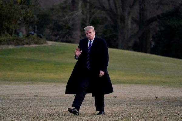 US President Donald Trump waves to the media as he returns to the White House after an annual physical test at the Walter Reed National Military Medical Center, Washington DC, United States, 8 February 2019 (Photo: Reuters/Yuri Gripas).